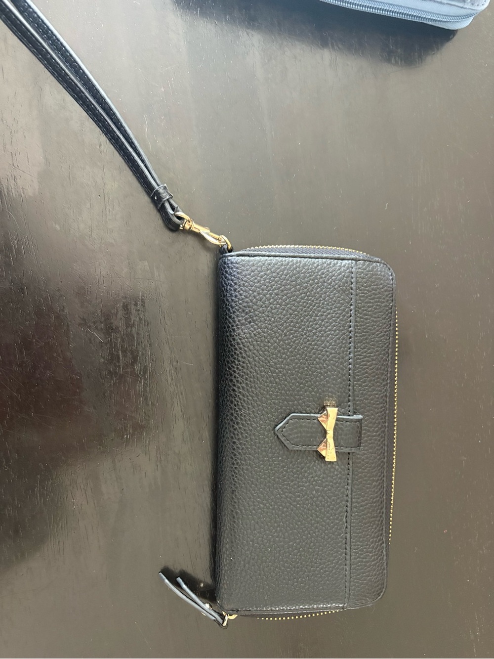 Black Pebbled Leather Wristlet with Gold Bow Accent